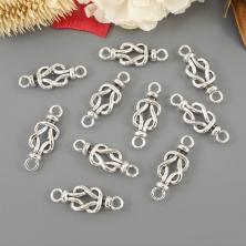 Коннектор "Узел" 24*8,5мм отв-е 2,5мм арт.ИВ-320 серебро