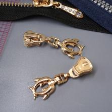 Бегунок Т.5 универсальный (трактор, металл) "Дельфин" арт.1687 золото